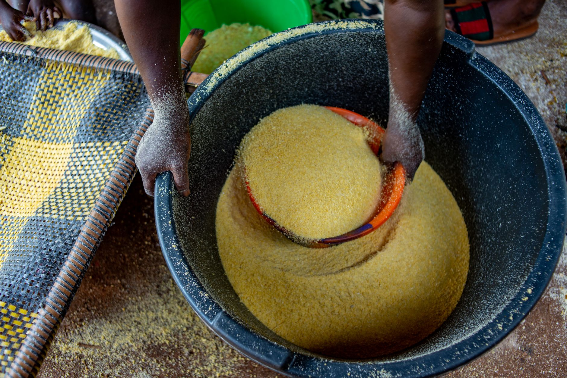 woman using cornmeal for cooking